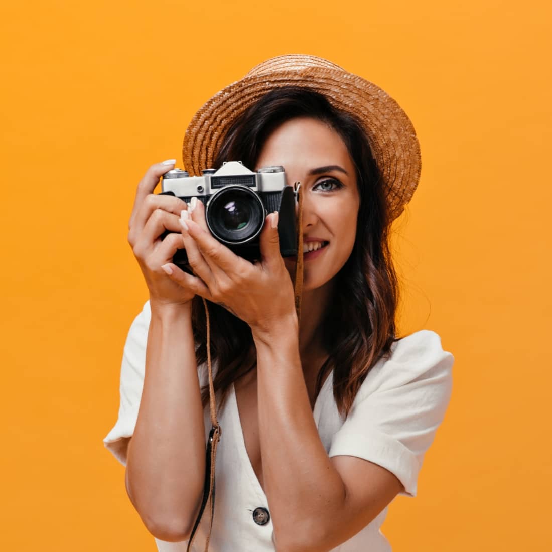 A woman is capturing a photo